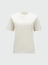 Remera blanca de algodón con cuello redondo y logo de Moncler en relieve en el pecho.