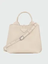 Cartera de mano Longchamp modelo Le Roseau S, confeccionada en cuero color verde con herraje metálico distintivo de la marca.