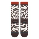 Medias Stance con diseño abstracto en espiral, color marrón y blanco, con puño acanalado color ladrillo y logo de la marca en el tobillo.