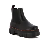 Botas Chelsea de cuero sintético negro con elásticos laterales, suela de plataforma y costuras naranjas.