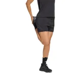 Short de running Adidas Adi365 Essentials 2 en 1 color negro, con calza interna incorporada, cintura elástica ancha y logo de la marca estampado en el lateral.