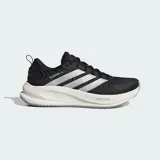 Championes de running Adidas Supernova Ease 2, con exterior de malla técnica en color negro y detalles plateados. Cuenta con mediasuela Dreamstrike para mayor amortiguación y suela de caucho.