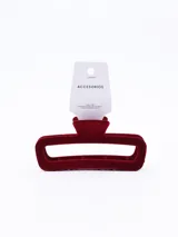 Pinza para el pelo de diseño rectangular con acabado aterciopelado en color bordó.