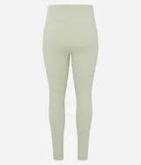 Legging deportivo de microfibra color verde claro, tiro alto, con moldería ajustada y bolsillo lateral funcional en el muslo.