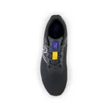 Championes New Balance Fresh Foam Arishi V4, color negro con detalles en blanco, azul y amarillo.