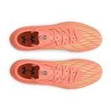 Championes de futbol Under Armour Magnetico Select 4 FG, de color naranja coral con suela verde lima y detalles en amarillo. Tienen cordones y el logo de la marca en el lateral.