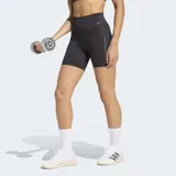 Calza corta deportiva Adidas modelo Optime Workout 3 Rayas, de color negro, tiro alto y ajuste ceñido. Confeccionada con tecnología Lycra® Sport y Adimove, cuenta con un bolsillo práctico en el muslo y detalle de las tres tiras características de la marca en el lateral.