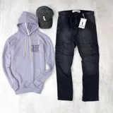 Canguro lila pastel de algodón sin felpa, con capucha y bolsillo tipo canguro. Estampa frontal con texto en letras negras.