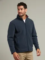 Campera azul marino de micropolar con cuello alto y cierre frontal.