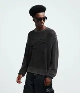 Suéter de punto texturizado color gris oscuro, con cuello redondo, mangas largas y detalle jacquard localizado en el pecho. Confeccionado en algodón.