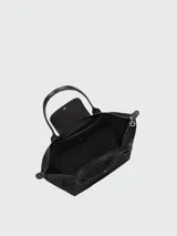 Bolso tote grande Le Pliage One de Longchamp, color negro, con asas superiores y solapa de cierre con botón a presión.