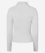 Blusa cropped de punto chenille color negro, con cuello alto y mangas largas raglán. Presenta una textura acanalada y pequeños puntos brillantes aplicados en el frente.