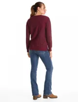 Buzo de manga larga con cuello a la base, confeccionado en tejidos combinados con texturas lisas y acanaladas. Presenta un diseño con tajos laterales en el ruedo.