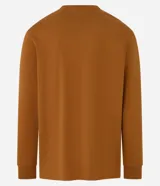 Remera de manga larga con cuello redondo, confeccionada en algodón. Presenta un corte comfort holgado y una pequeña etiqueta decorativa en el bajo.