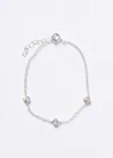 Pulsera de cadena forcé en plata 925 con tres puntos de luz ovalados engastados con zirconias blancas.