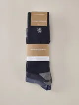 Pack de tres pares de medias largas de la marca Benson & Thomas, modelo Sapporo 5.0 Plain. Incluye un par azul marino con bordado plateado, un par gris oscuro con talón y puntera grises, y un par azul jaspeado.