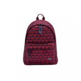 Mochila Lacoste Neocroc de color rojo y azul con estampado geométrico en 3D. Cuenta con un compartimento principal con cierre de doble cursor, un bolsillo frontal con cierre y tiradores de cordón, asa superior de mano y el clásico logo del cocodrilo bordado en la parte inferior.