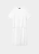 Camiseta de algodón blanca, de corte oversize, cuello redondo y manga corta con diseño holgado.