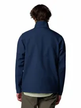 Campera softshell Columbia azul marino con tecnología Omni-Shield, cortaviento y resistente al agua, con cuello alto, cierre frontal y bolsillos con cierre.
