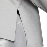 Buzo Nike de mujer, modelo Yoga Dri Fit, color gris. Confeccionado en tejido French Terry absorbente de sudor, con capucha y corte holgado.