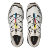 Championes Salomon modelo XT-6 de color negro, diseñados para trail running y uso urbano, con sistema de ajuste rápido Quicklace y suela con gran tracción.