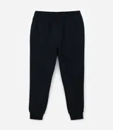 Pantalón deportivo de corte jogger, color negro, con cintura elástica ajustable mediante cordón, bolsillos laterales y puños acanalados en los tobillos. Confeccionado en tejido de algodón con interior felpudo.