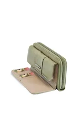 Billetera larga marca Lincoln's, color bordó con interior beige. Presenta un diseño con solapa frontal, múltiples compartimentos para tarjetas, visor y monedero con cierre.