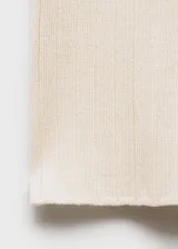 Pantalón de punto acanalado con diseño flare y cintura elástica.