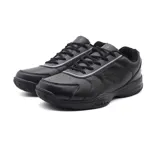 Championes de tenis Lotto modelo SK2005, confeccionados en cuero sintético negro con detalles perforados para mayor ventilación, cierre de cordones y suela de goma resistente.