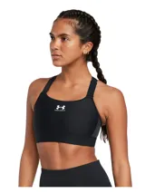 Top deportivo de alto impacto Under Armour, color negro, con tecnología HeatGear® que absorbe el sudor. Presenta diseño de compresión, correas ajustables con cierre de gancho y logo de la marca estampado en el centro.