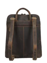 Mochila de cuero marrón oscuro, elaborada de forma artesanal, con bolsillo frontal con relieve de diseño botánico de hojas. Cuenta con compartimento para notebook y cierre.