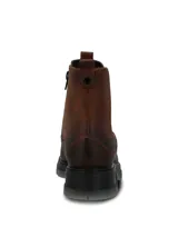 Botín tipo Chelsea de cuero color marrón, con paneles elásticos laterales negros y suela robusta de poliuretano con base gris traslúcida.