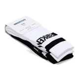 Pack de dos pares de medias tipo crew Birkenstock, una blanca y una negra, con diseño acanalado y logo de la marca en contraste.