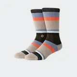 Medias Stance Frankfurt Crew con diseño a rayas horizontales en tonos beige, marrón, naranja, celeste y negro.