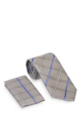 Corbata verde oscuro con estampado floral y pañuelo de bolsillo a juego.