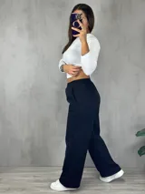 Pantalón de jogging gris melange, de corte amplio y cintura elástica.