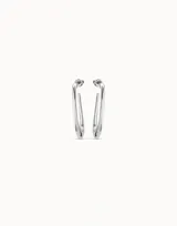 Aros ovalados irregulares bañados en plata, elaborados artesanalmente en España.
