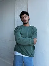 Buzo verde de algodón, corte oversize.