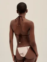 Bikini de cobertura media con estampado de cebras, tiras finas regulables y forro de poliamida.