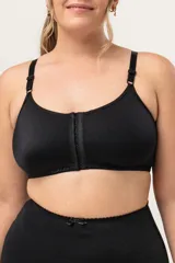 Top corrector de postura negro con breteles elásticos regulables y prendido delantero.