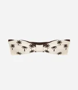 Top de bikini bandeau reversible confeccionado en microfibra de poliamida biodegradable, con tirantes finos marrones removibles y diseño de palmeras bordadas en tono marrón sobre base off-white.