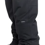 Pantalón técnico Rip Curl de la línea Anti Series, color negro, diseñado para condiciones climáticas adversas. Presenta un corte recto, cintura con cierre de botones y trabillas para cinturón, ofreciendo funcionalidad y resistencia.