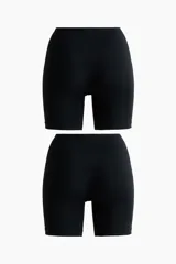 Pack de dos culottes tipo biker de tiro alto con efecto moldeador en cintura, caderas y glúteos. Confeccionados en tejido elástico seamless con refuerzo interior.