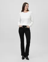 Buzo de tejido combinado marca Zac & Rachel en color blanco, con cuello redondo y mangas largas con diseño calado. Presenta un cuerpo con textura de punto acanalado.