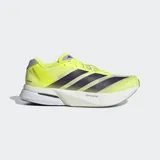Championes de running Adidas Adizero Boston 13, color amarillo neón con las icónicas tres rayas laterales en color negro. Presenta una mediasuela gruesa con tecnología Lightstrike Pro y suela de alto rendimiento.