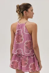 Top halter estampado con flores, confeccionado en una delicada mezcla de algodón y seda.