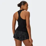 Musculosa Fabletics Tech+ Racerback azul marino con diseño de espalda deportiva, confeccionada en tejido ligero y elástico que absorbe el sudor.