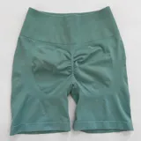 Short deportivo color verde agua, de tiro alto y corte ajustado, con frunce en la parte trasera.