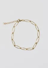 Pulsera dorada de acero quirúrgico con eslabones ovalados y cierre de mosquetón con cadena de extensión.