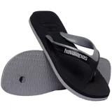 Sandalias de dedo Havaianas modelo Dual, color negro con tiras anchas en tono gris y negro con el logo de la marca en relieve.